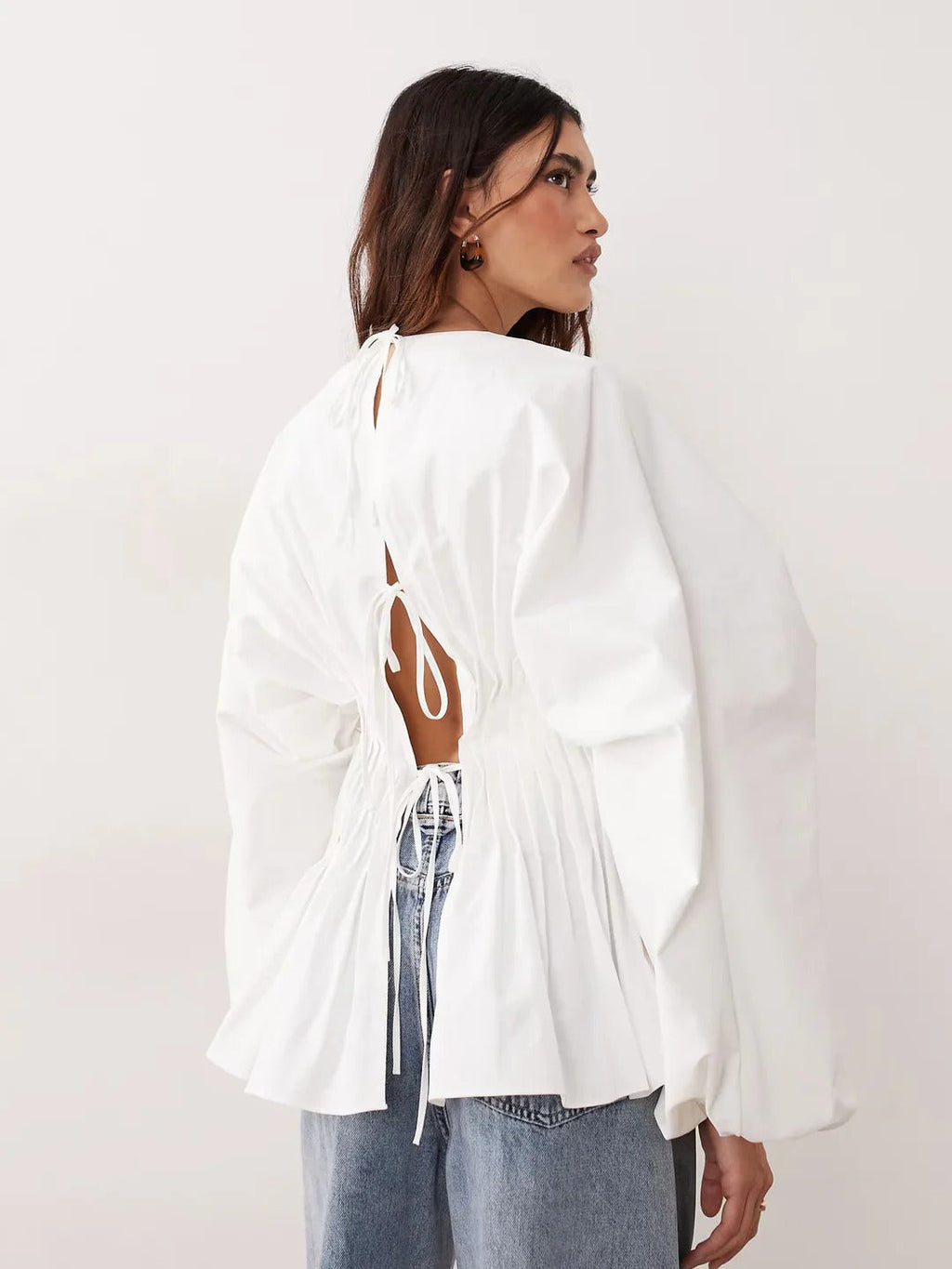 Modern Pintuck Open-Back Peplum Blouse
