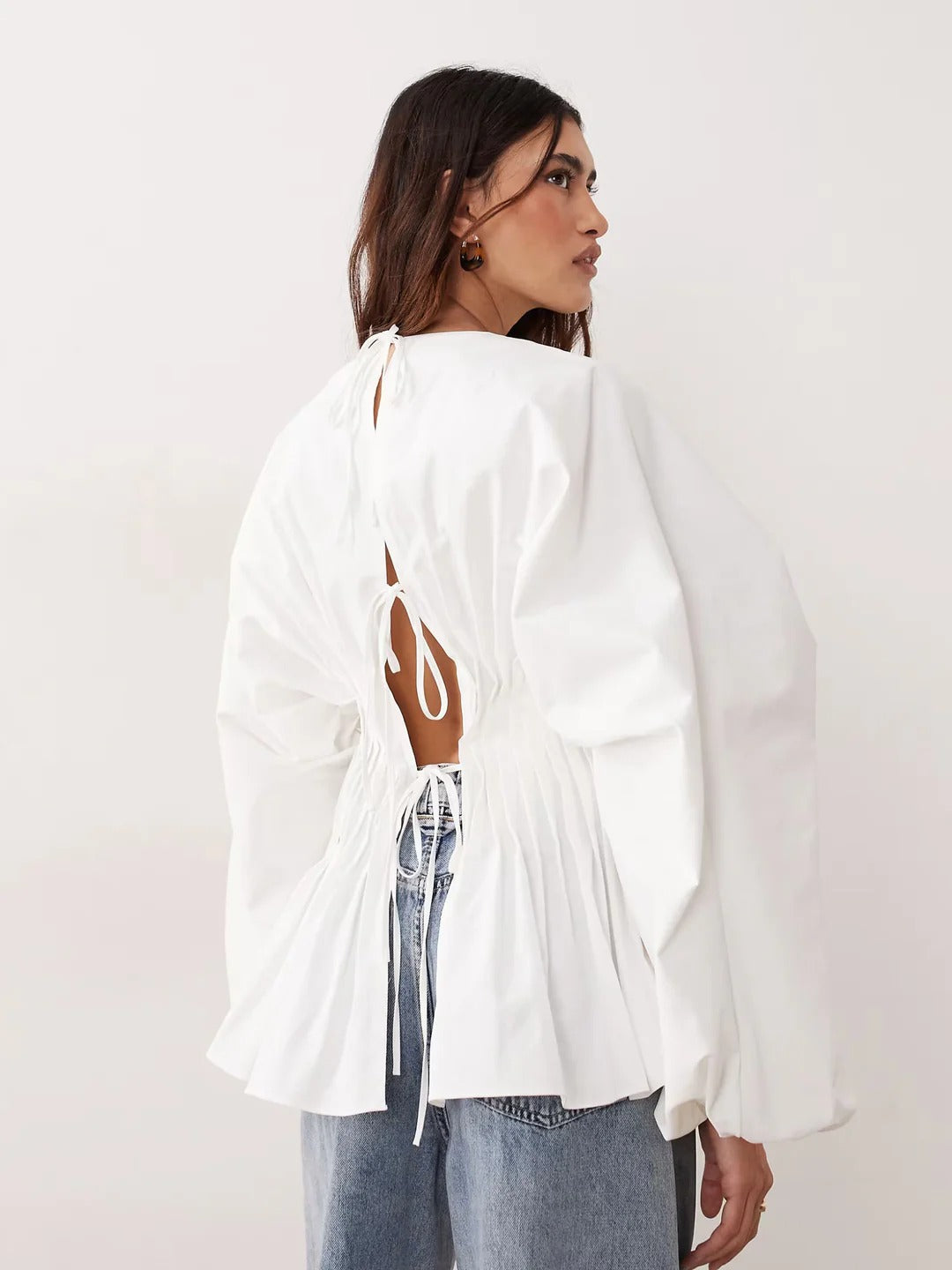 Modern Pintuck Open-Back Peplum Blouse